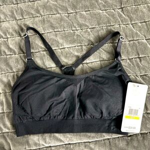 Women’s under armour black sports bra size medium
